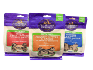 Three packages of dog treats are shown.