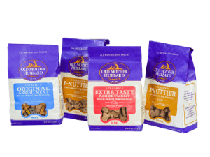 A group of four bags of dog treats.