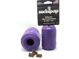 A purple sodapup toy next to some dog treats.