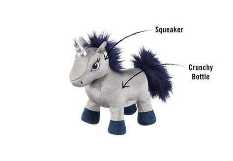 A stuffed unicorn with squaker on its head.